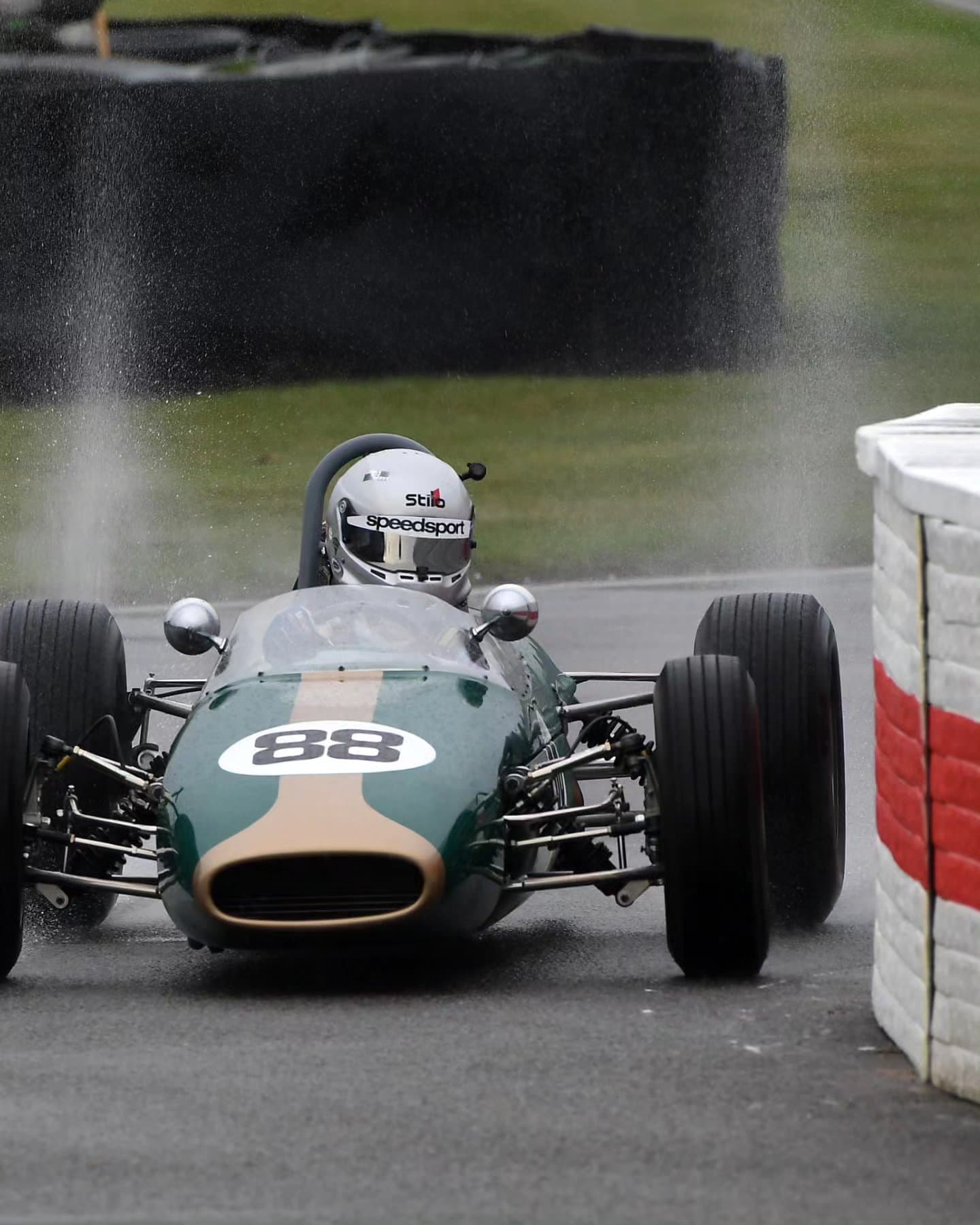 Historic single-seater on a wet circuit, car 88