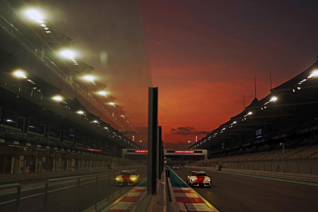 Toyota GT4 on the pit straight at dusk, Abu Dhabi 2024